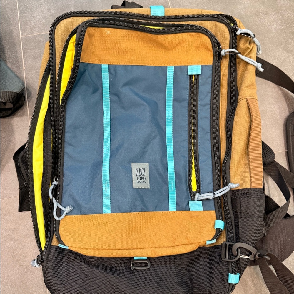 Topo Designs Blue and Brown Backpack